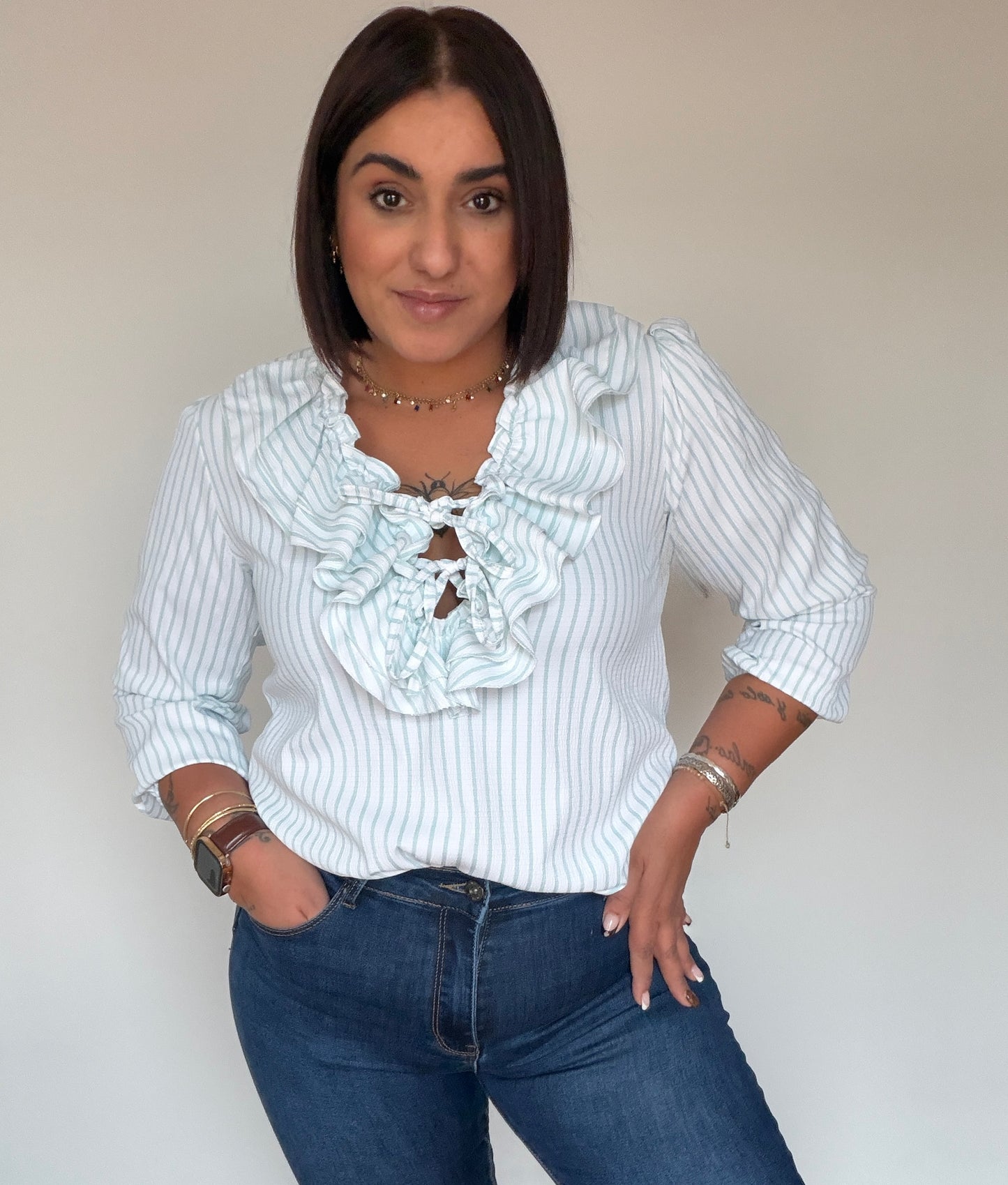 Blusa de rayas verde menta vista de frente destacando el diseño bohemio Meknes